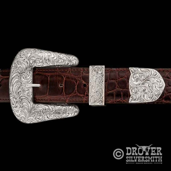 A beautiful Solid Sterling Silver three piece belt buckle set built for a 1.5 inch belt. This buckle set will be your go-to for daily wear with it's Classic Traditional Western style.